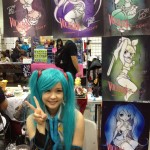 I can't find this artist's card, but I thought her Vocaloid pin-ups were super cool.