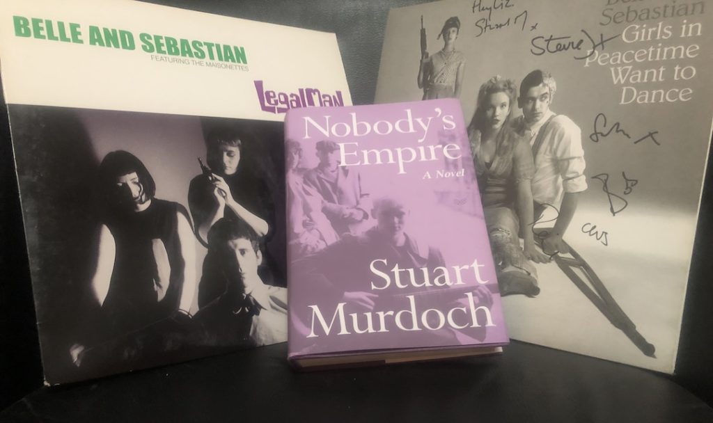 Belle & Sebastian "Legal Man" 12" vinyl single and signed vinyl copy of Girls in Peacetime Want to Dance plus hardcover copy of Nobody's Empire by Stuart Murdoch (Photo: Liz Ohanesian)